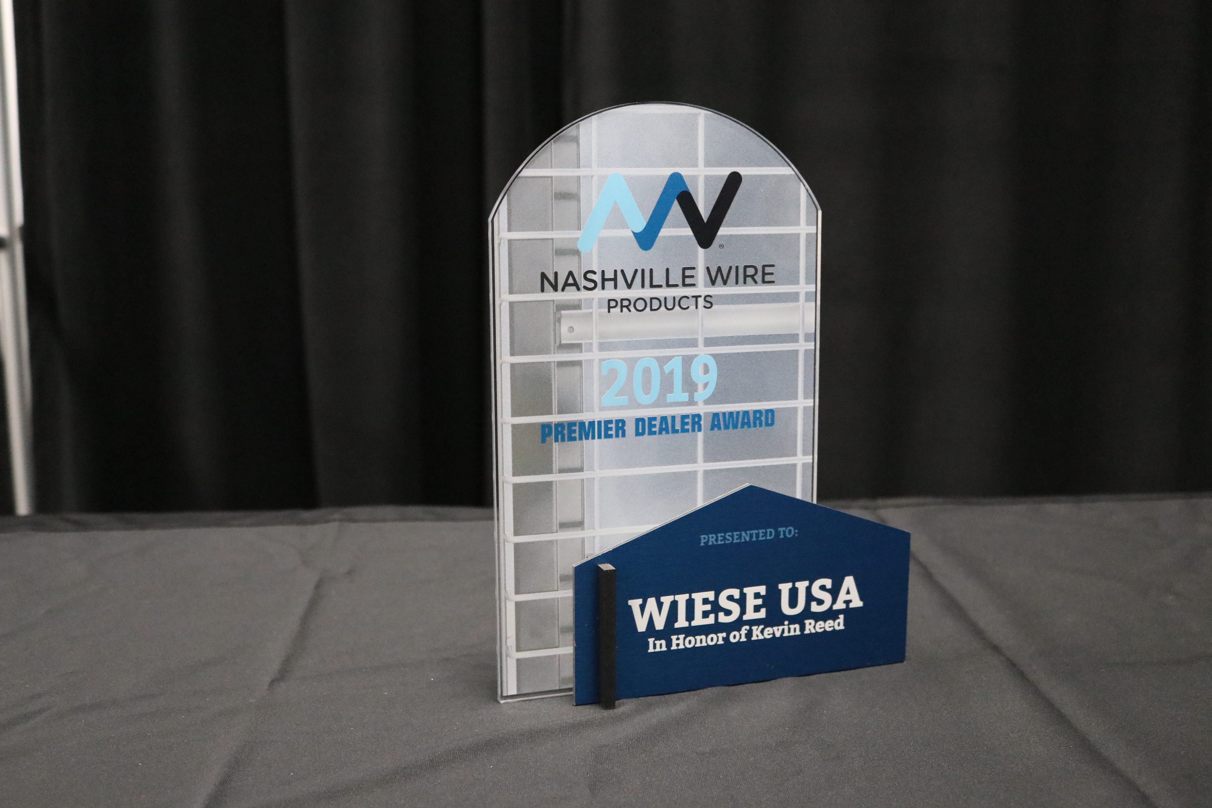 Premier Dealer award with printed frosted acrylic back and brushed silver dibond front.