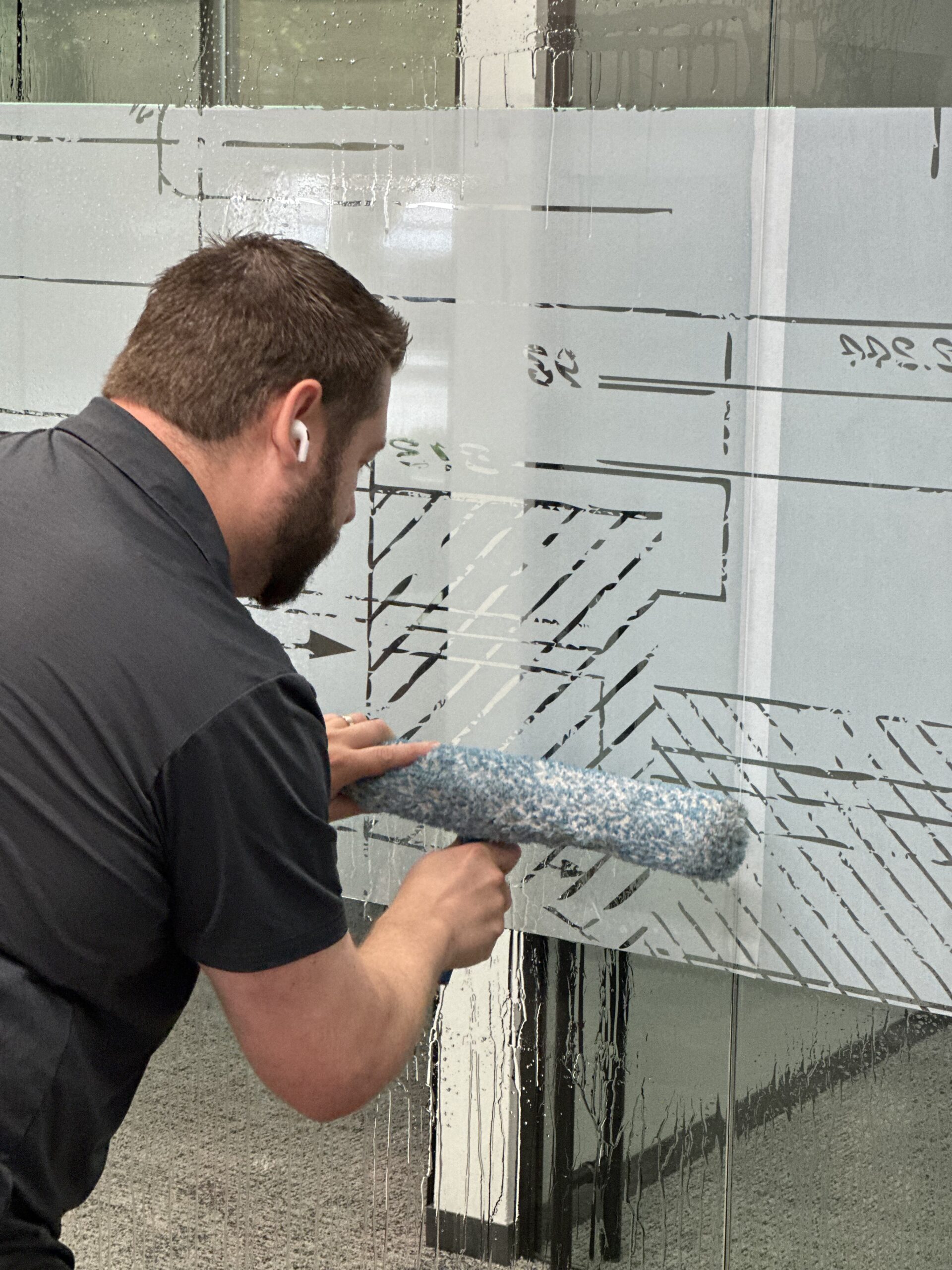 custom printed privacy film window vinyl custom printed privacy film window vinyl being installed in corporate office building