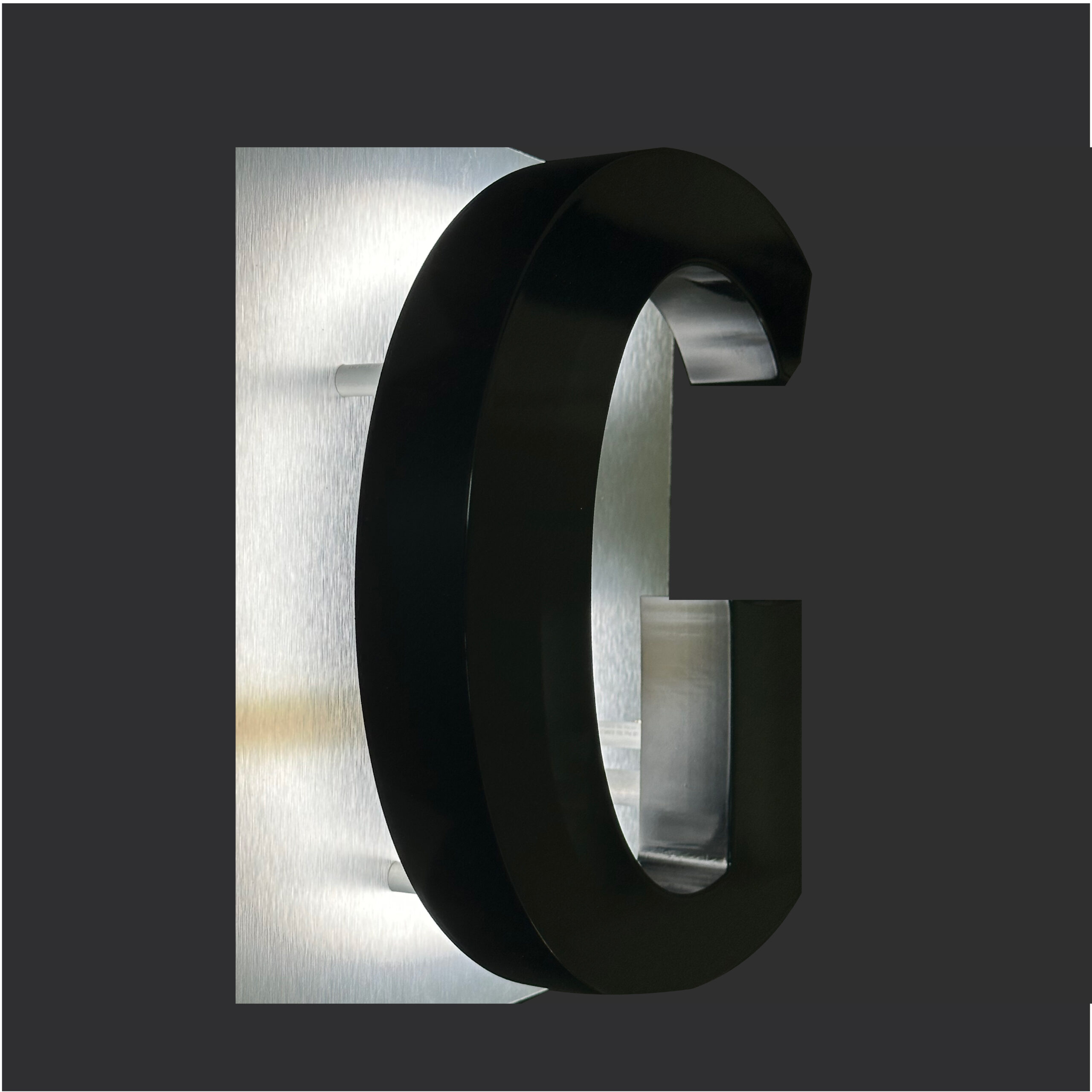 LED Letters for custom signage Return halo LED letters for custom signs on brushed silver aluminum metal