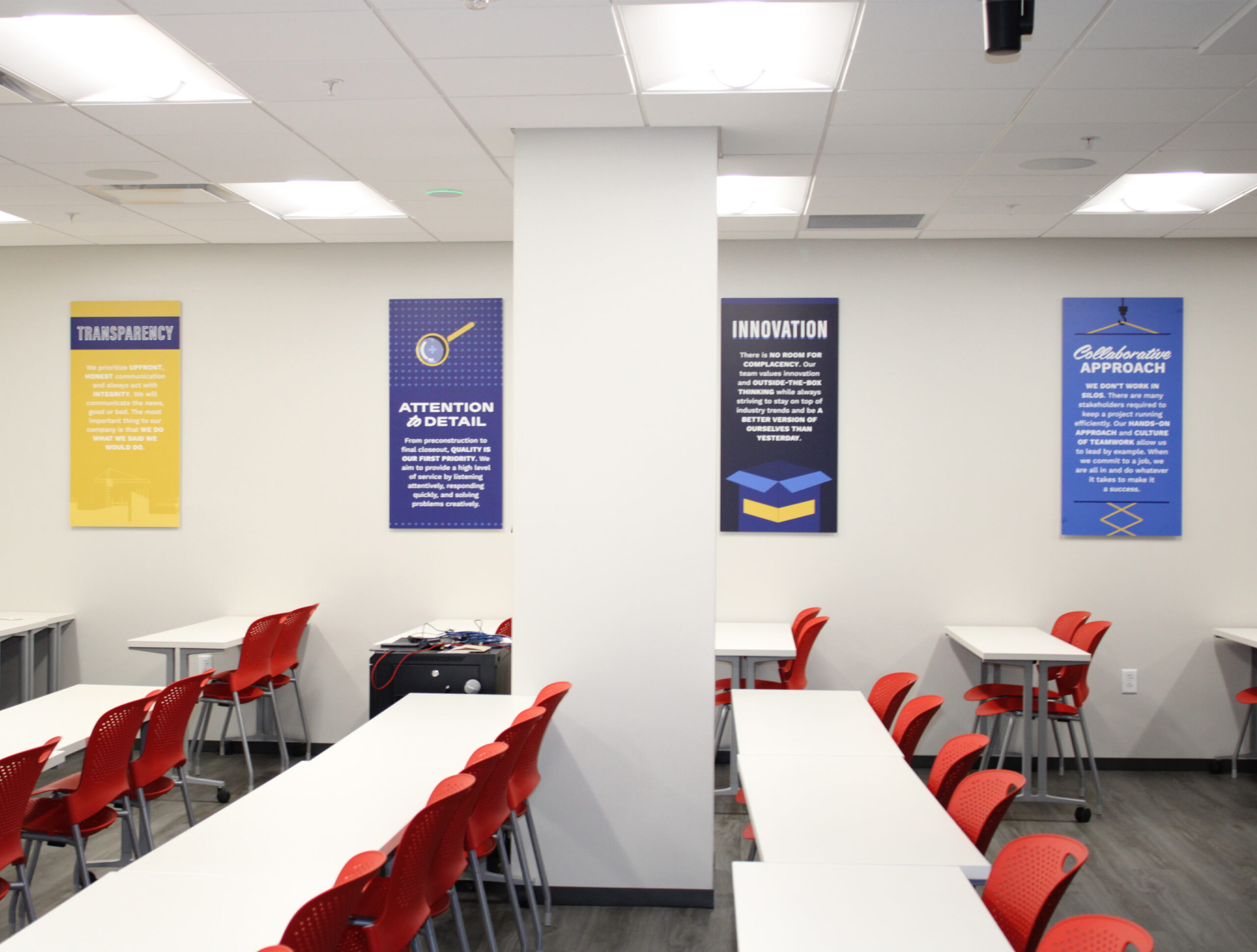 Core values and mission statement posters for office decor Core values and mission statement posters displayed in meeting room of corporate office building