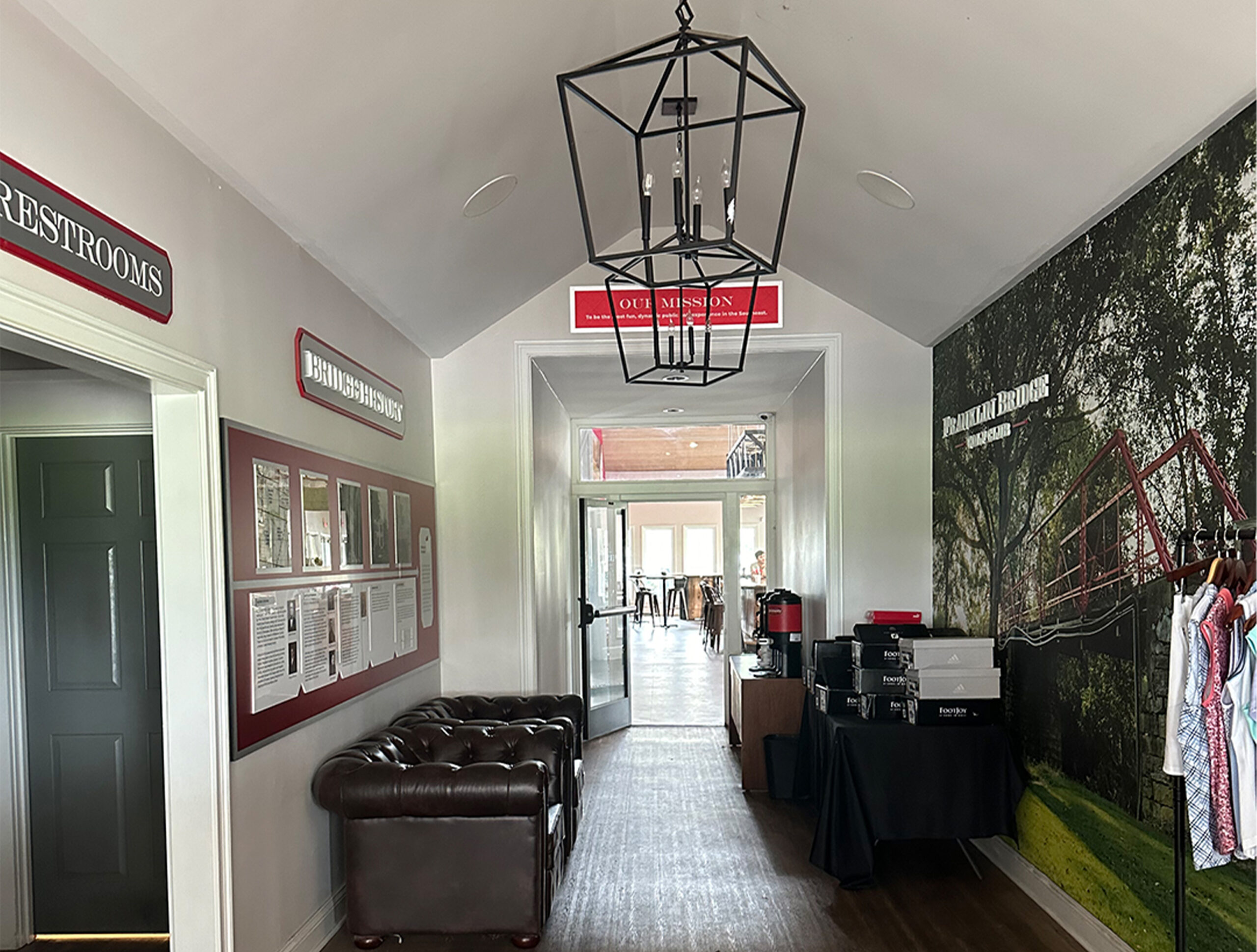 Lobby with Custom Signs and Printed wallpaper Lobby entrance showing custom printed wallpaper, 3d logo and custom printed acrylic signage with photos and message boards
